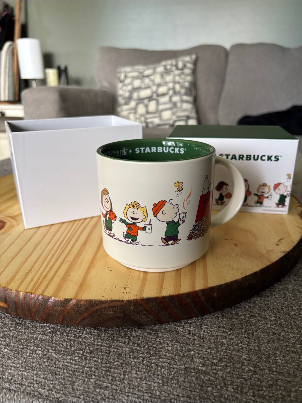 Mug with Starbucks and Peanuts characters
